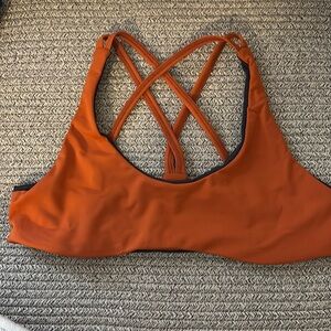 Tera Kaia Orange& grey sports bra